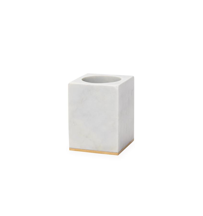Gold-trimmed marble toothbrush holder against a white background.