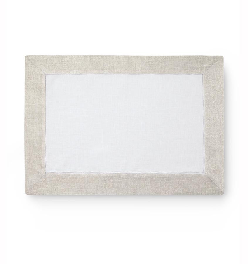 https://www.sferra.com/cdn/shop/products/sferra-filetto-set-of-four-placemats-1602s4pmat-white-gold-silo_ad60fe50-9163-4e4d-89ab-53cd6f235a38_1024x1024.jpg?v=1602877847